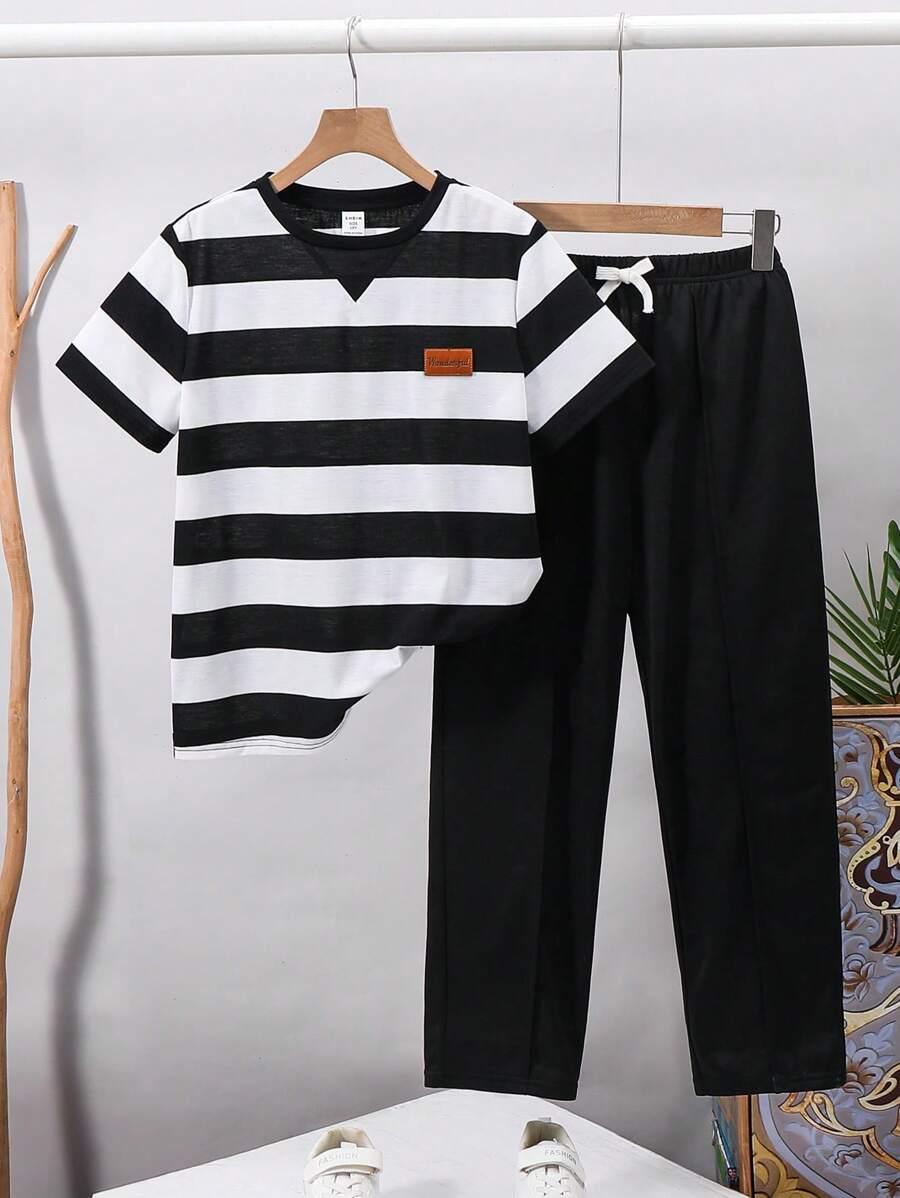 SHEIN KOMPLET KOSZULKA SPODNIE S06__134/140