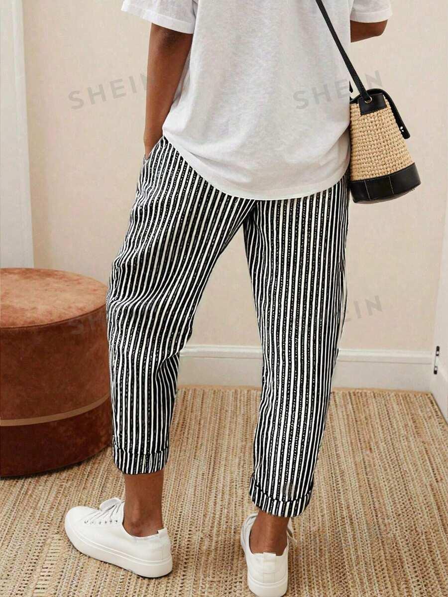 SHEIN SPODNIE WZÓR PASKI S06__M