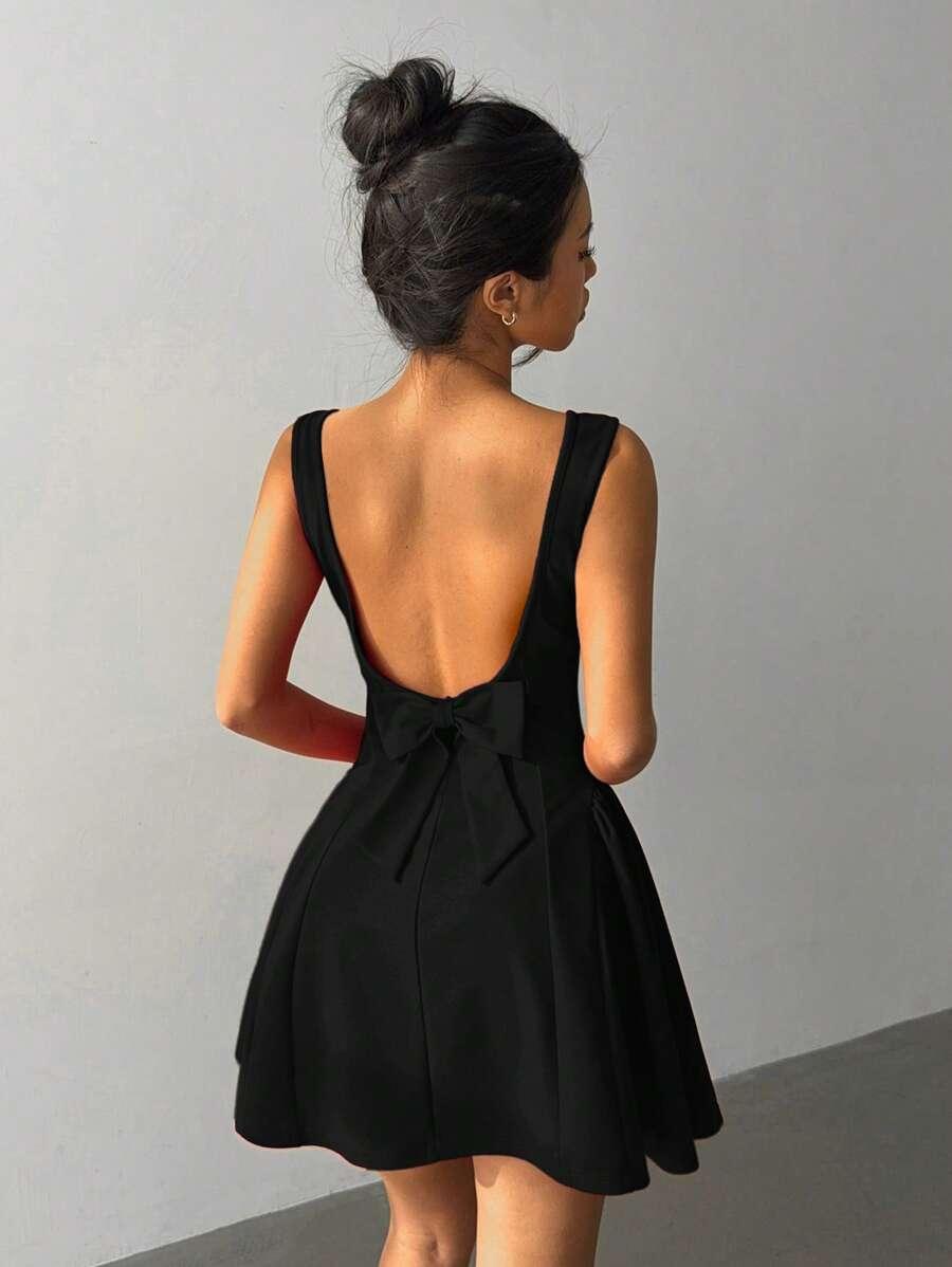 SHEIN CZARNA MINI SUKIENKA KOKARDA ODKRYTE PLECY S06__XS