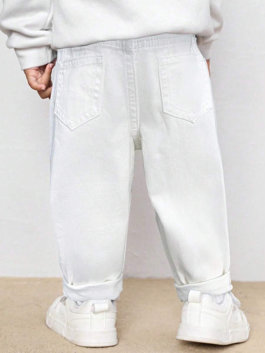 SHEIN BIAŁE SPODNIE JEANS PRINT S06__74/80