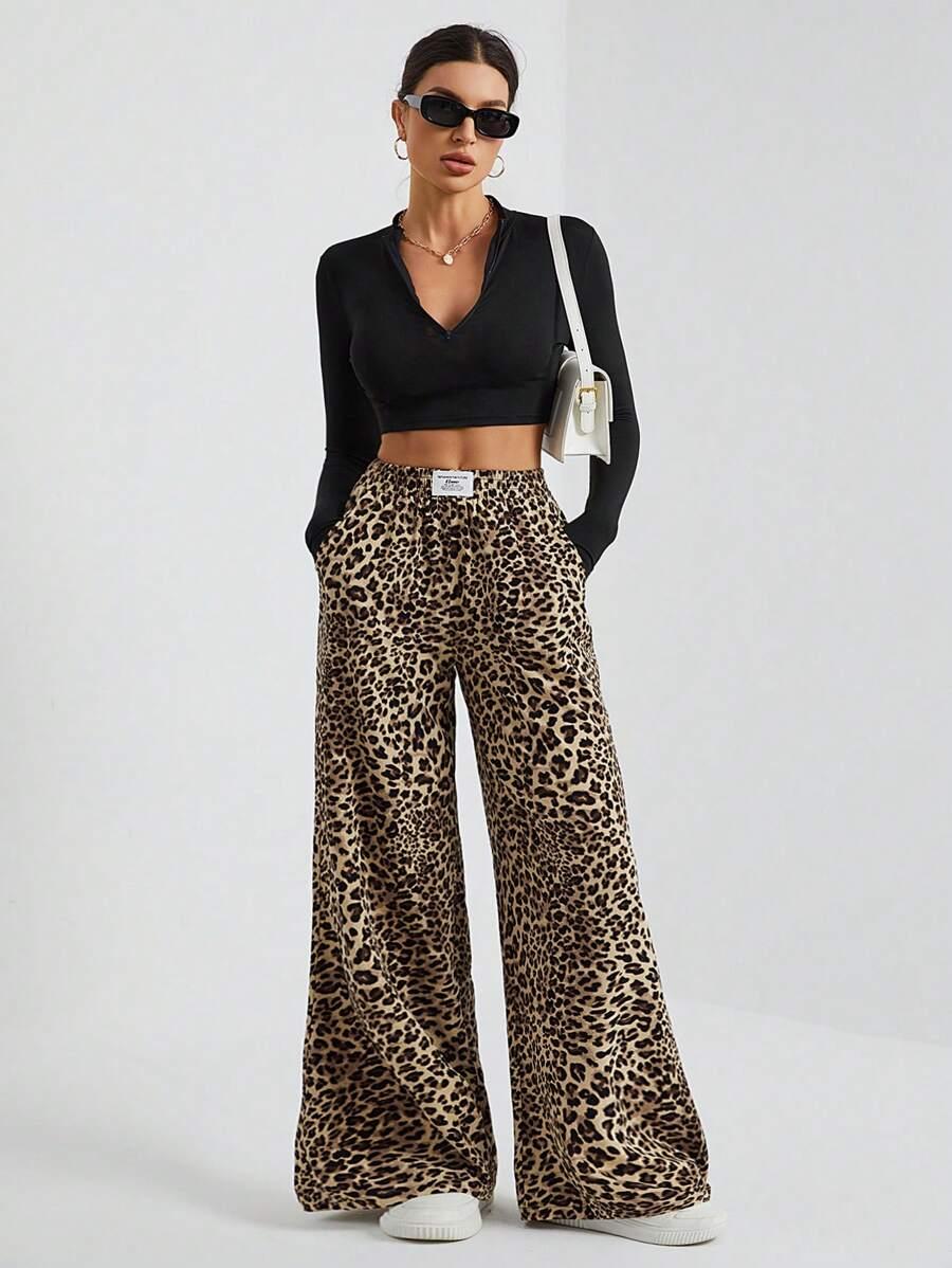 SHEIN SPODNIE ANIMAL PRINT S06__M