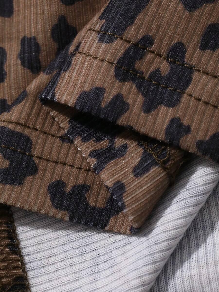 DAZY BLUZKA Z KRÓTKIM RĘKAWEM STÓJKA ANIMAL PRINT PK01__M
