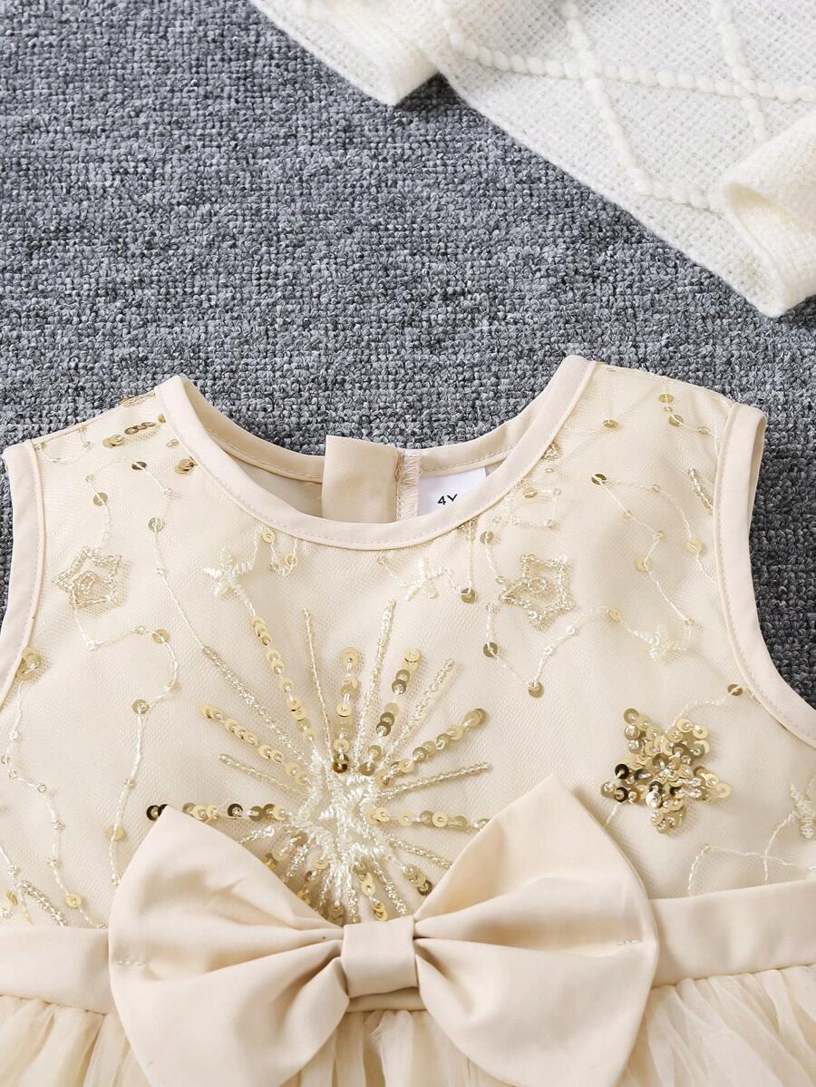 SHEIN KREMOWA SUKIENKA ROZKLOSZOWANA ZDOBIENIE CEKINY KOKARDA S06__104-110
