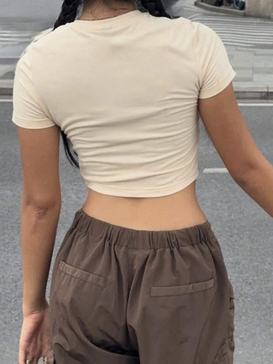 SHEIN KRÓTKI TOP DINOZAURY S06__L