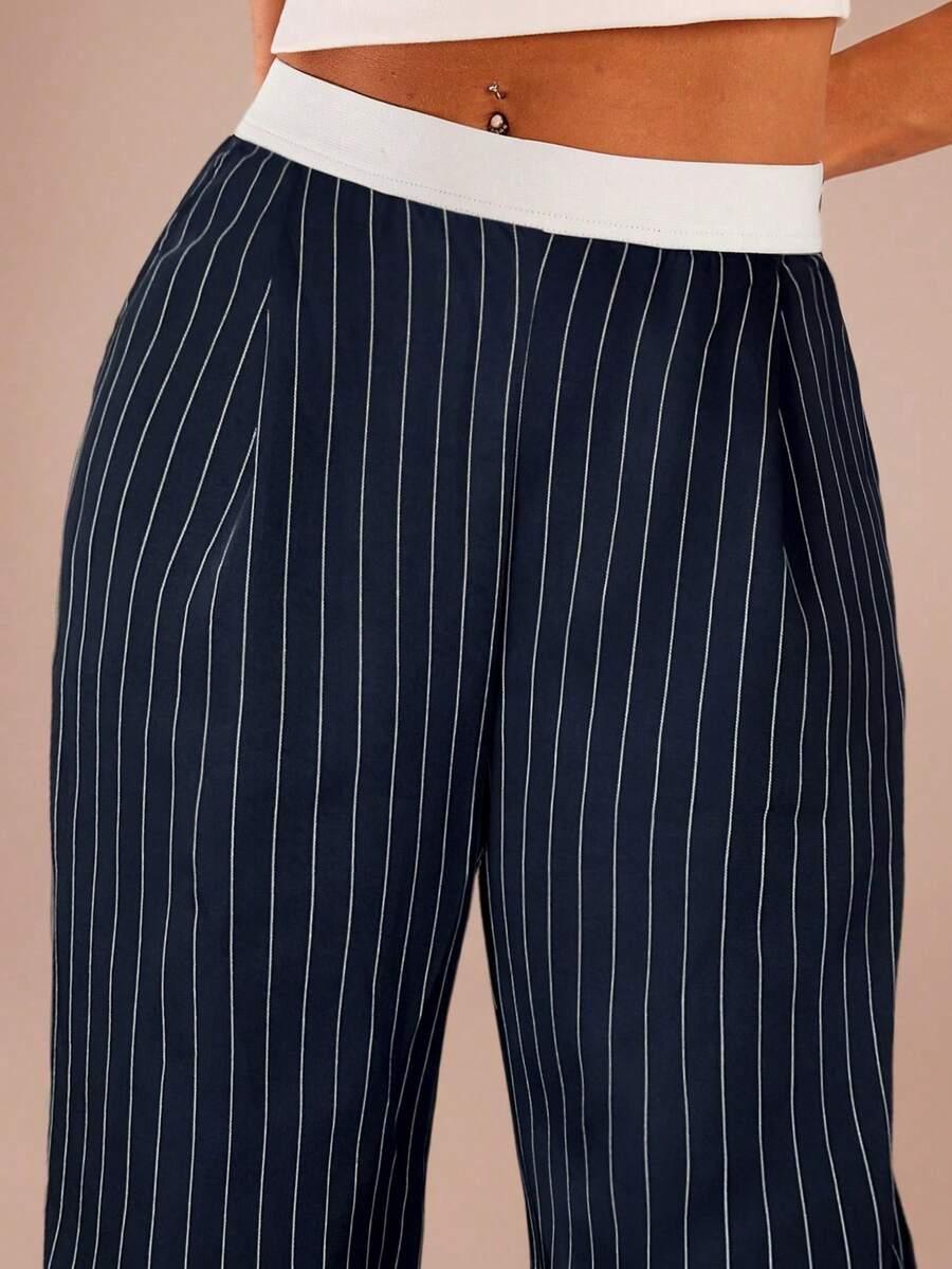 SHEIN SPODNIE WZÓR PASKI S09__L