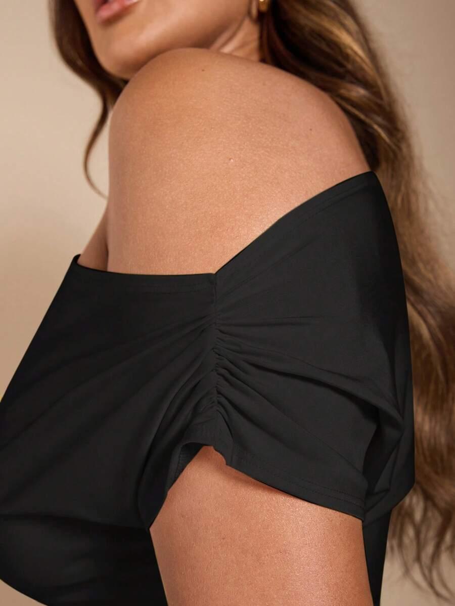 SHEIN CZARNA ASYMETRYCZNA BLUZKA PK01__50