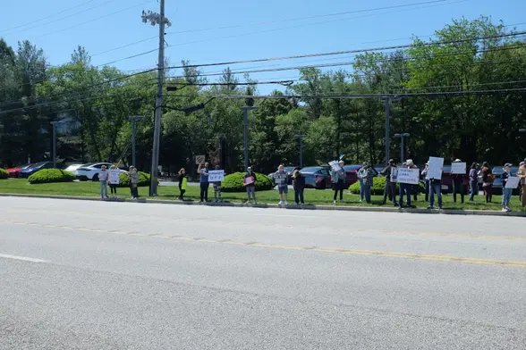 The crowd at a Tesla Takedown demonstration
