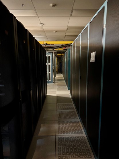 in between the rack rows at a data center