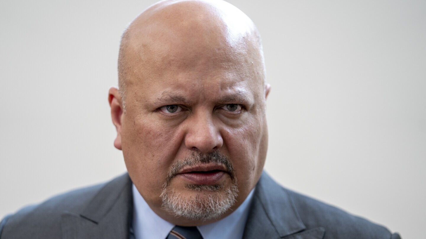 Karim Khan, Prosecutor of the International Criminal Court looks up prior to a press conference in The Hague, Netherlands, July 3, 2023. (AP Photo/Peter Dejong, File)