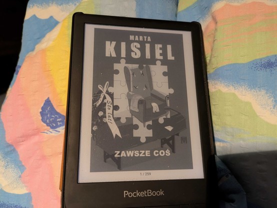 Okładka e-booka "Zawsze coś" Marty Kisiel. E-book ma 259 stron.