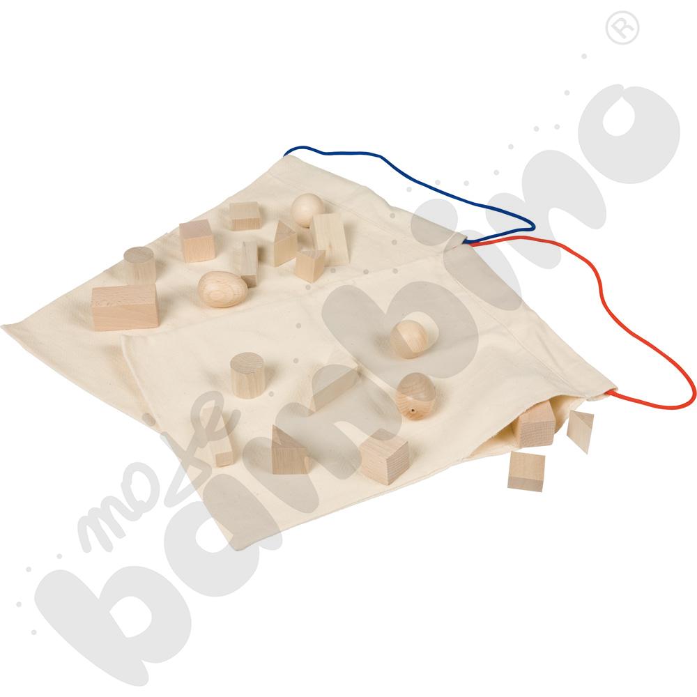 Tajemnicze woreczki Montessori - bryły geometryczne