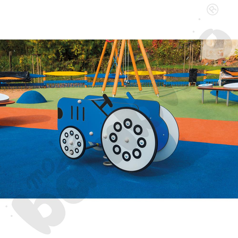 Sprężynowiec Traktor na podstawie betonowej