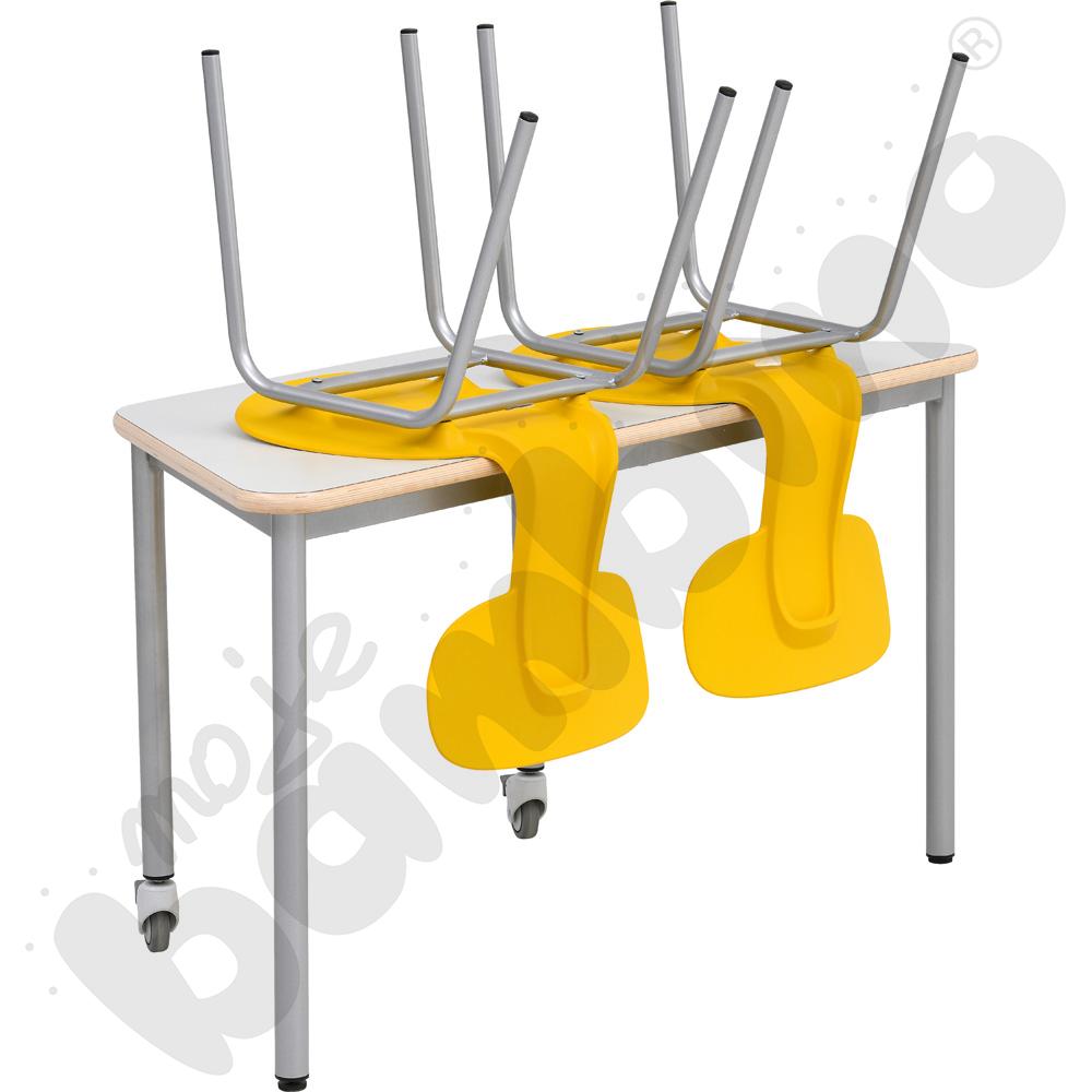 Stół Mila trapezowy szary HPL z krzesłami Ergo żółtymi, rozm.5