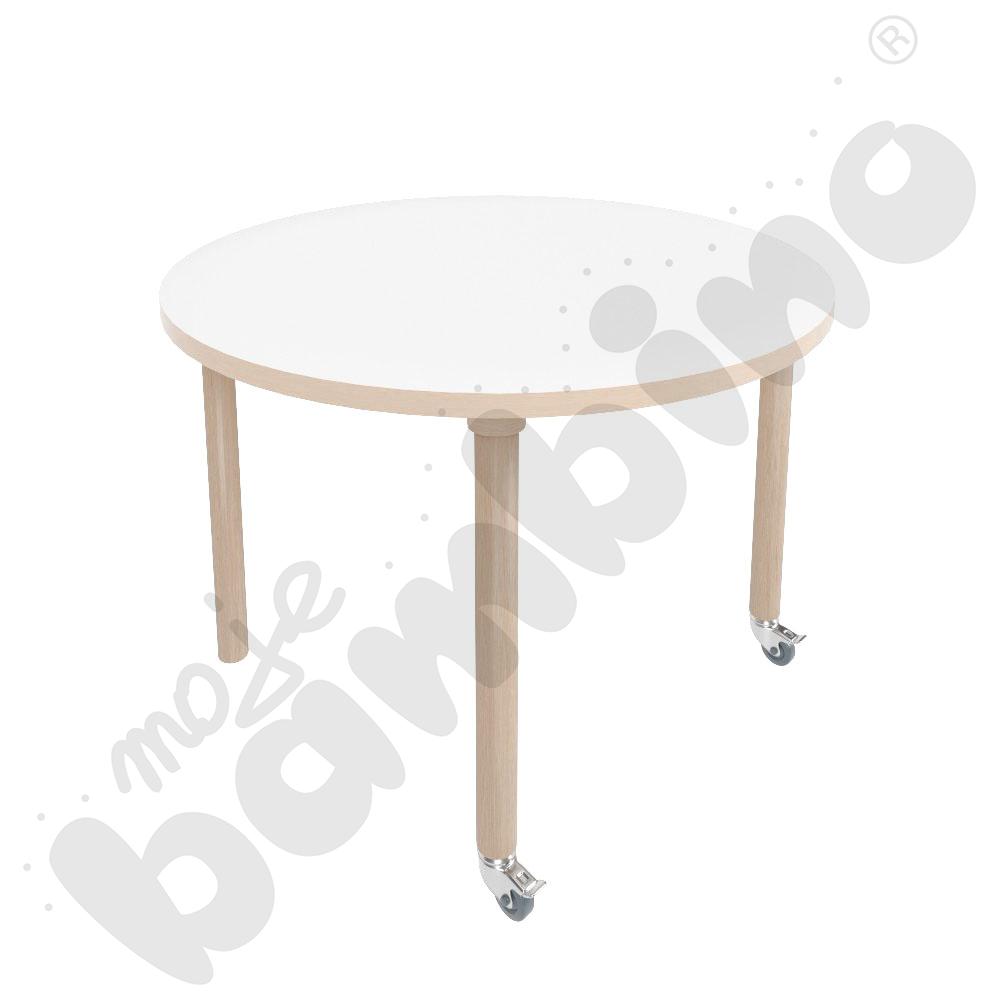Stół Marcus śr. 90 cm, rozm. 4, nogi drewniane brzozowe z 2 kółkami, blat biały, obrzeże ABS