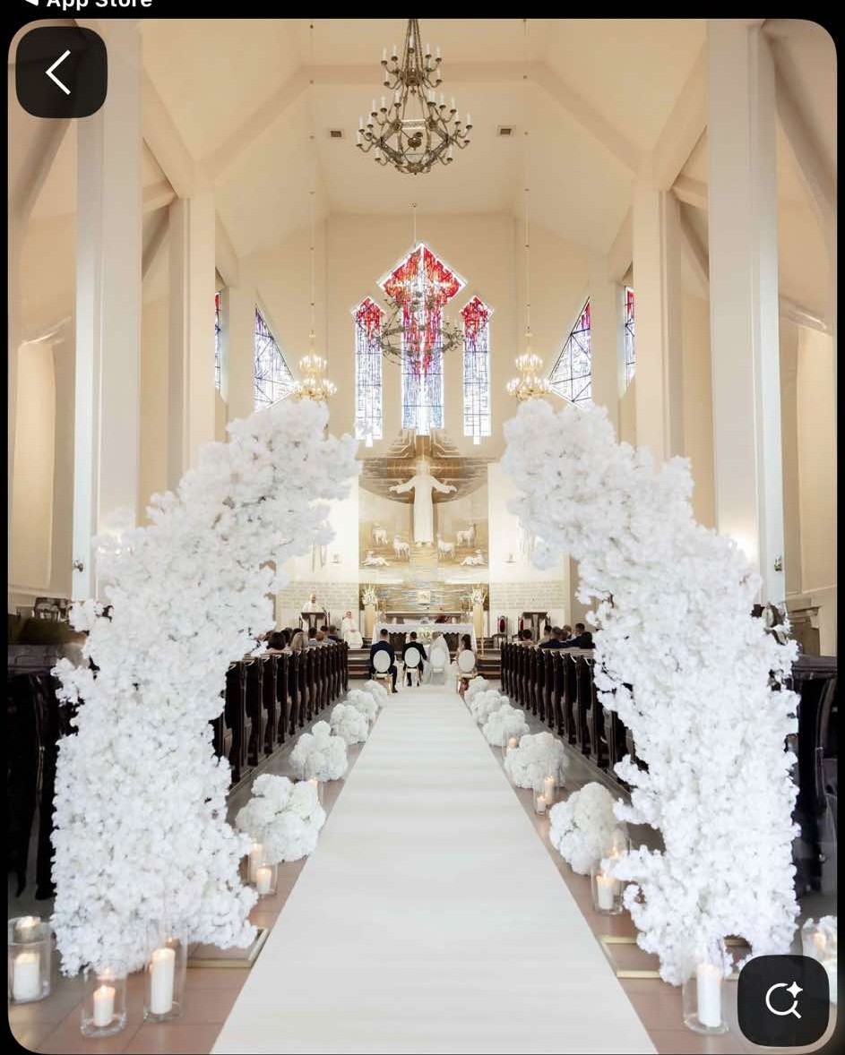 Hej czy ktoś w Ełku zajmuje się wynajmem takiej bramki z kwiatkami i białym dywanem na ślub?